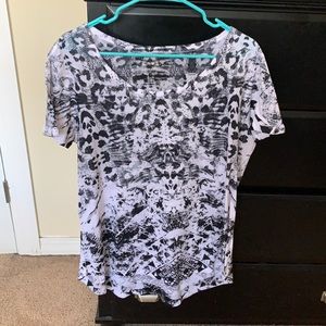 Black and white T-shirt with grommet details